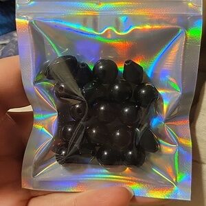 Various Black Plastic Or Acrylic Beads in Holographic Pouch